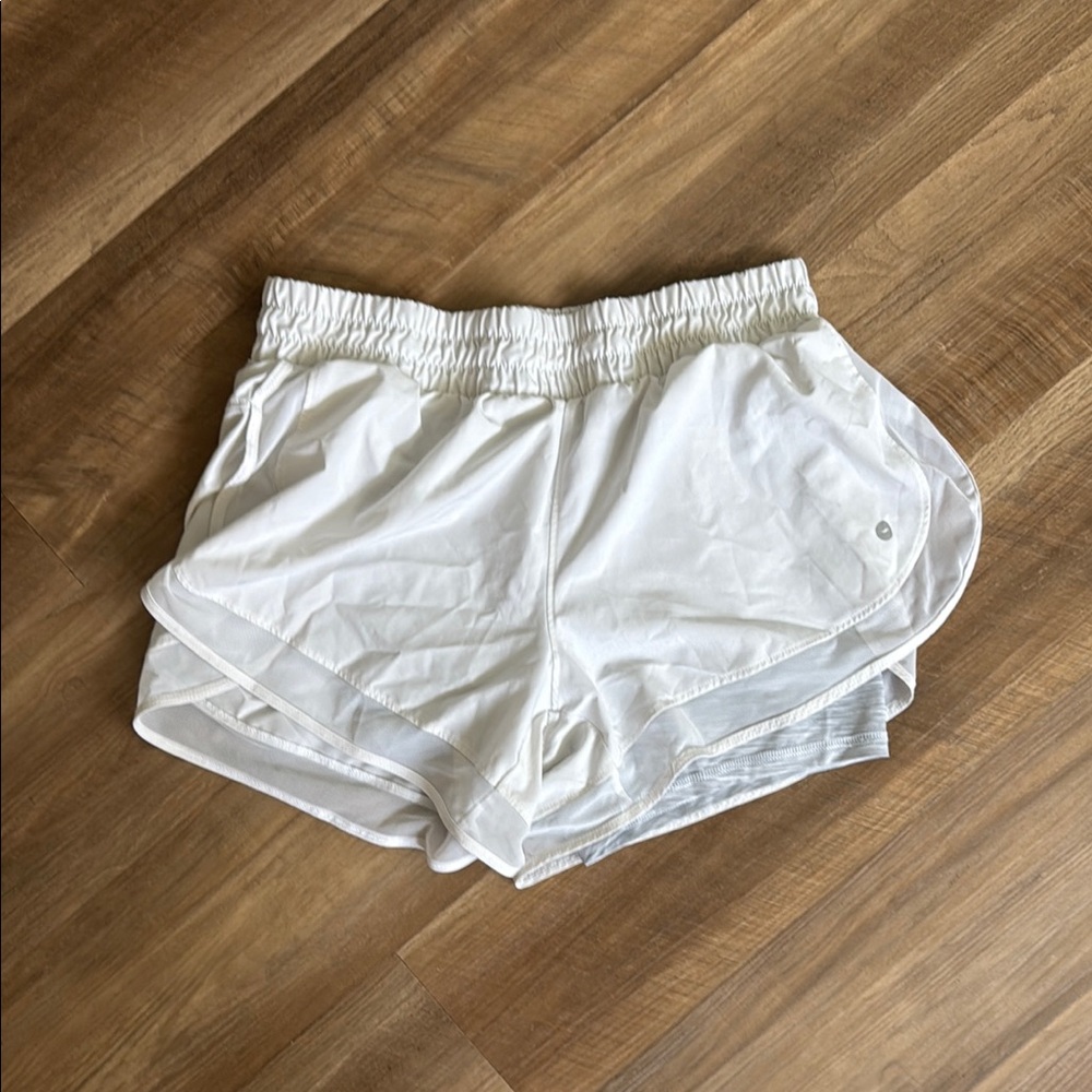 White Athletic Shorts with Elastic Waistband and Moisture-Wicking Fabric